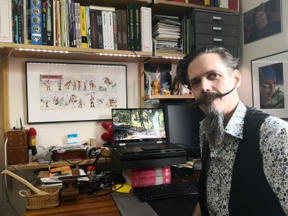 Me at desk with laptop, Rick O’Shay, Tintin and the Phantom in the background